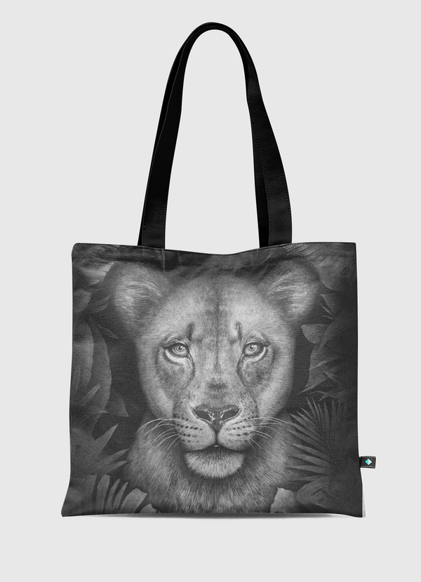 Lioness in tropical leaves Tote Bag